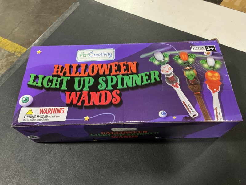 Condition photo showing New/Like New for ArtCreativity Halloween Light Up Spinner Wands with Sounds, Set of 3 LED Halloween Wands, Witch, Pumpkin, Light Spinner Halloween Toys for Kids with LEDs and Fun Sounds Small