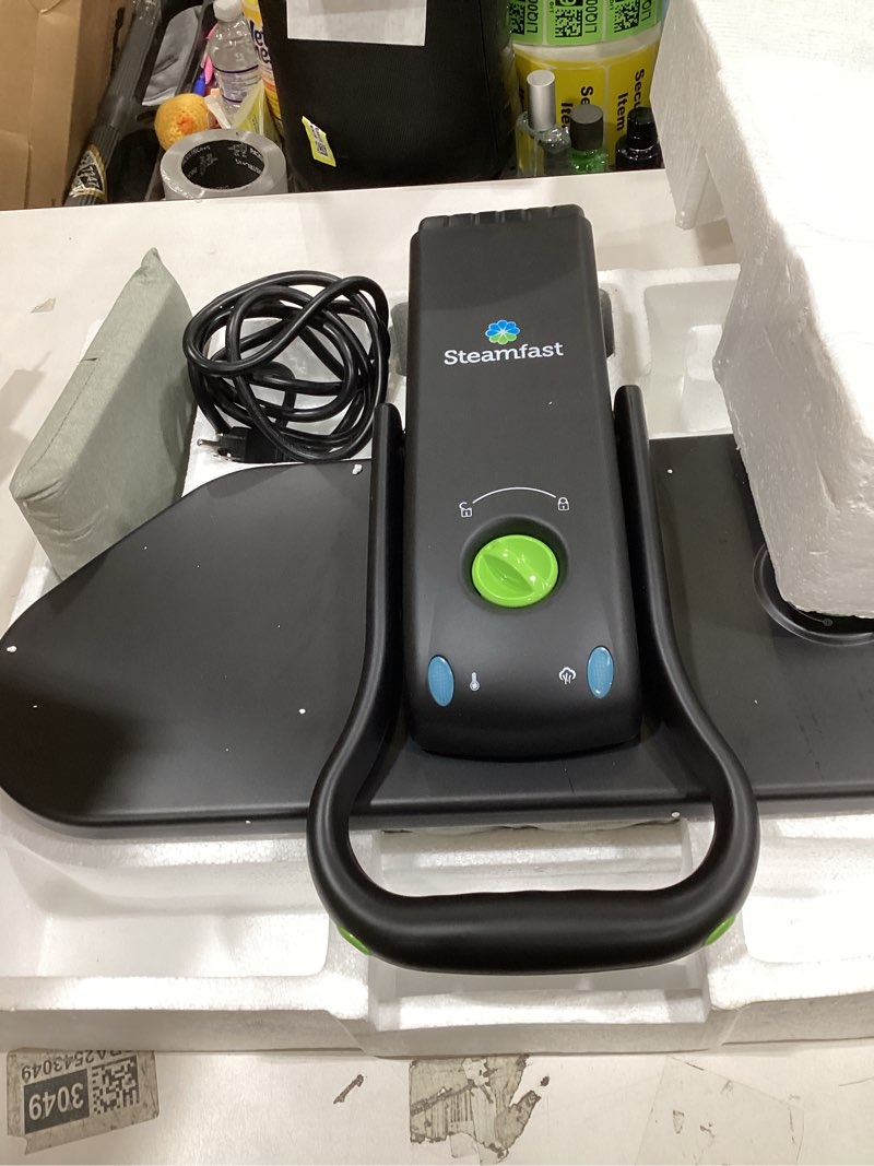 Condition photo showing Good Condition for Steamfast SF-623 Mid-Size Steam Press with Multiple Fabric Settings and Steam Burst Function, Black, 20.47" L x 17.16" W x 6.73" H M Steam Press