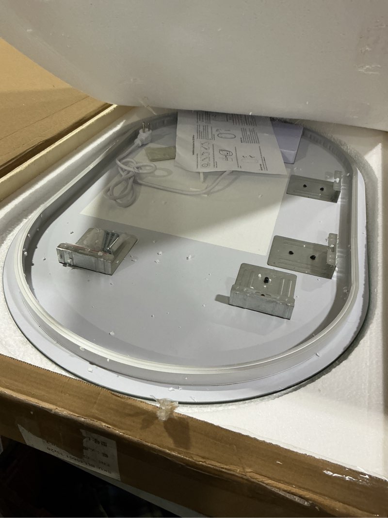 Condition photo showing As Is for Niccy Oval LED Bathroom Vanity Mirror, 32x20inch Frameless Backlit Mirror with Light, Smart Anti-Fog Waterproof Mirror with Memory Function Dimmable Lighted Mirror Back Lit 32"L x 20"W