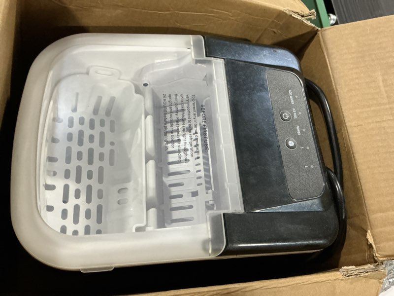 Condition photo showing As Is for dumos ice maker countertop, ice machine with portable handle, basket and scoop, 26lbs daily, 9 bullet cubes in 6-8 mins, auto-cleaning for home, kitchen, office, outdoors, rv camping