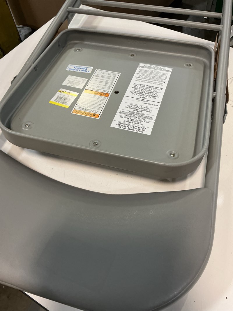 Condition photo showing As Is for cosco gray standard folding chair with padded seat (indoor)