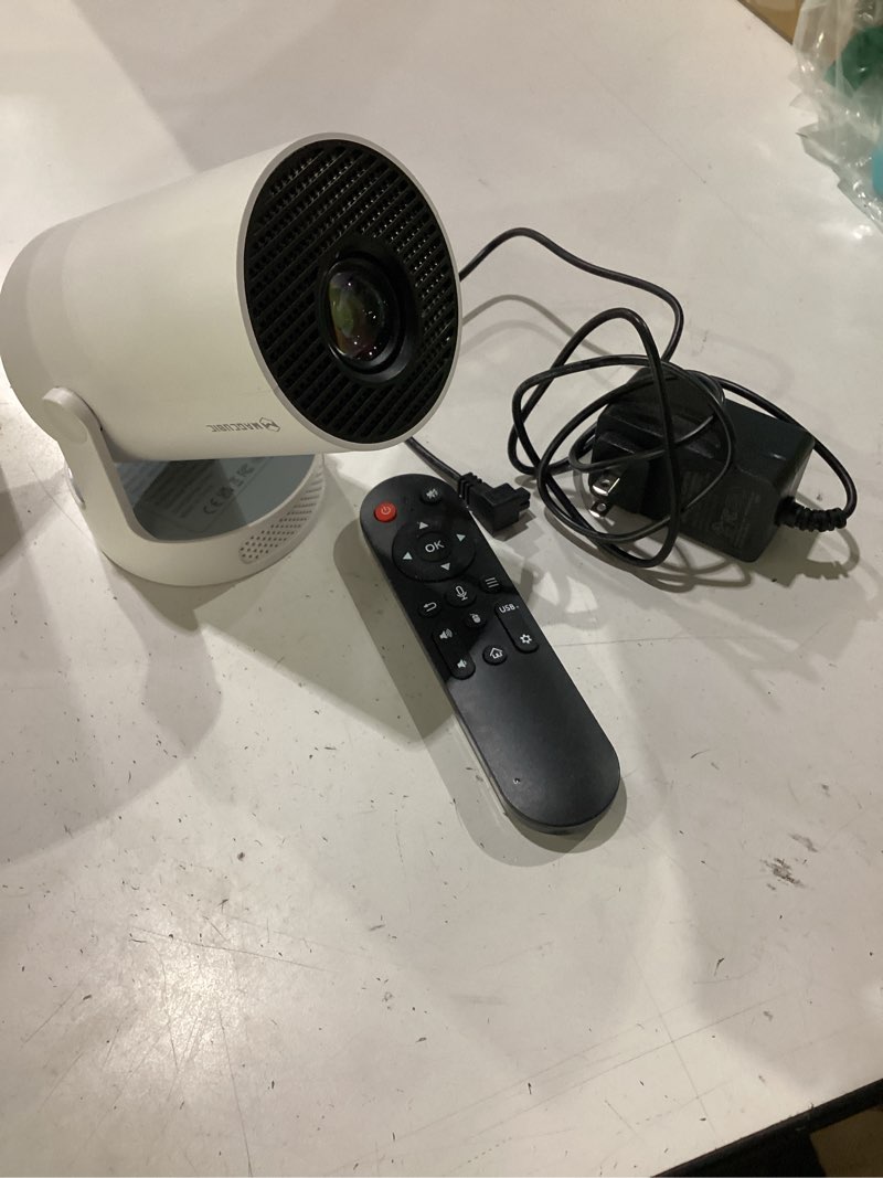 Condition photo showing Good Condition for magcubic mini projector with wifi 6 and bluetooth 5.4, portable projector 4k support, 5w soundbase speaker, auto vertical keystone 180°rotatable smart proyector for movie home outdoor white