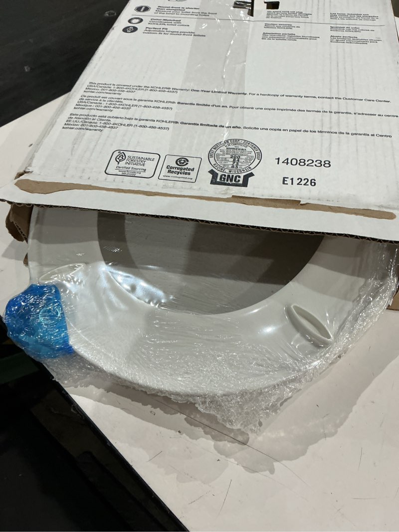 Condition photo showing New/Like New for kohler 20111-0 brevia, slow close toilet seat, round toilet seat, grip-tight bumpers quick-attach hardware, white