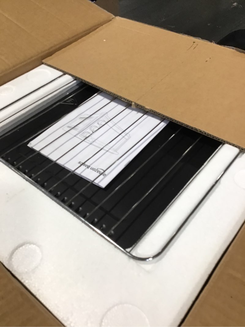 Condition photo showing New/Like New for Amazon Basics 6-Slice 23-QT Toaster Oven with Built-In Air Fryer, 7-In-1 Cooking Options, 60-Min Timer & Adjustable Temperature (200? - 450?), With Accessories, 1500W, Stainless Steel, Silver/Gray