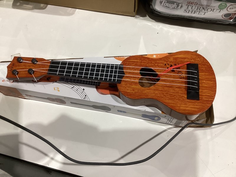 Condition photo showing Good Condition for YEZI Kids Toy Classical Ukulele Guitar Musical Instrument, Brown
