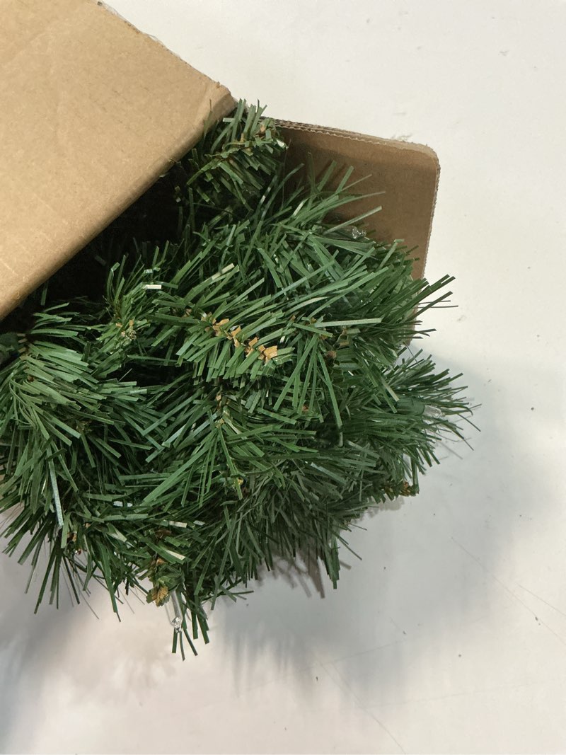 Condition photo showing Good Condition for national tree company 24 in pre-lit majestic fir mini artificial christmas tree, 35 clear lights, 71 tips, red cloth base, green plug in w/red bag tree