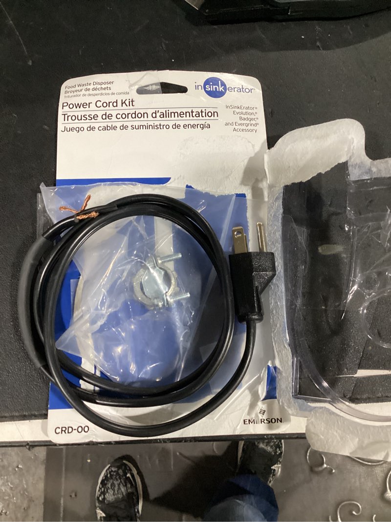 Condition photo showing As Is for insinkerator power cord accessory kit rubber