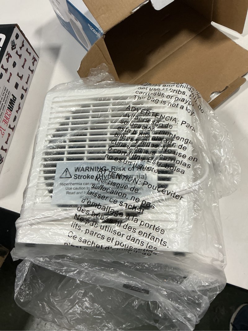 Condition photo showing As Is for  Utilitech 1500 -Watt Fan Compact personal Indoor Electric Space Heater with Thermostat