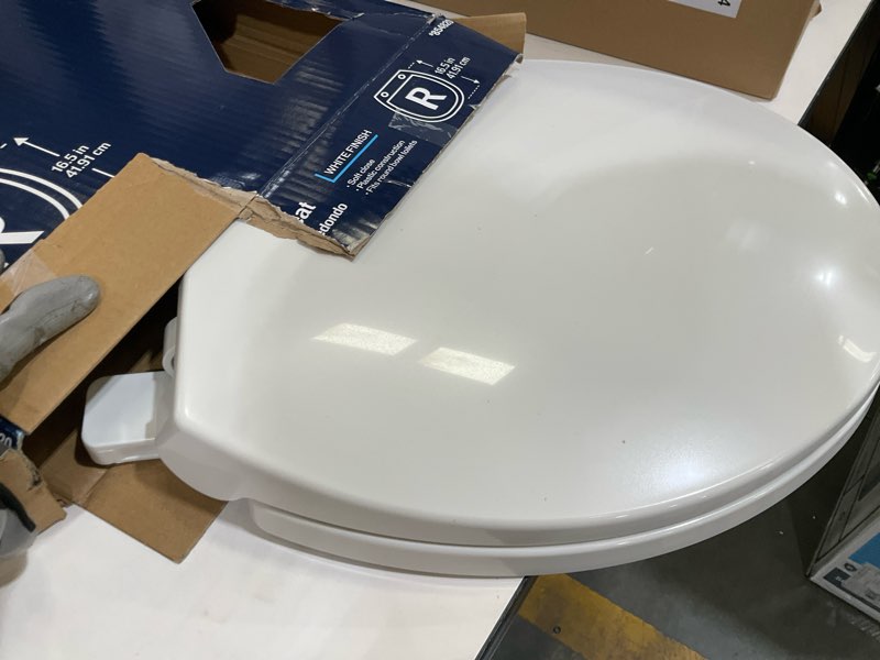 Condition photo showing As Is for project source plastic white round soft close toilet seat