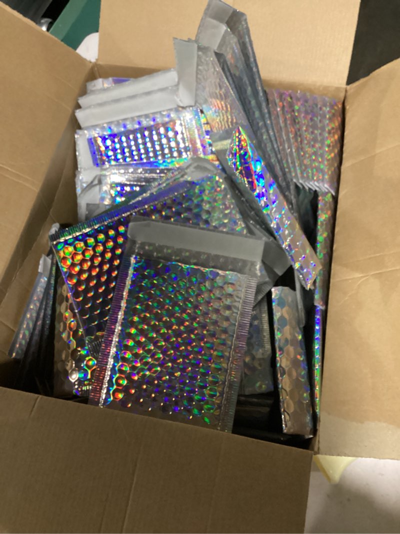 Condition photo showing New/Like New for (similar to)  pieces holographic bubble mailers padded mailer holographic bubble mailers padded envelopes self sealing cushion envelopes for mailing, shipping and packing(silver, 9.5 x 6 inch) silver 9.5 x 6 inch