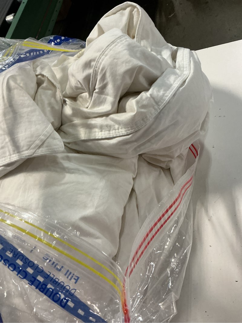 Condition photo showing As Is for quince premium down comforter, king/cal king, down