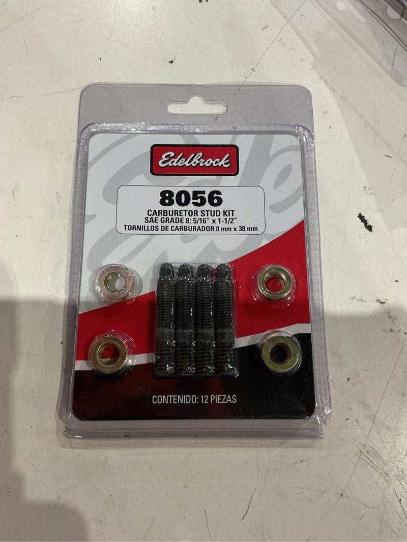 Condition photo showing New/Like New for edelbrock 8056 carburetor, mounting studs, bullet nosed, black oxide, gold iridite washers/nuts, 5/16" x 1.5", set of 4