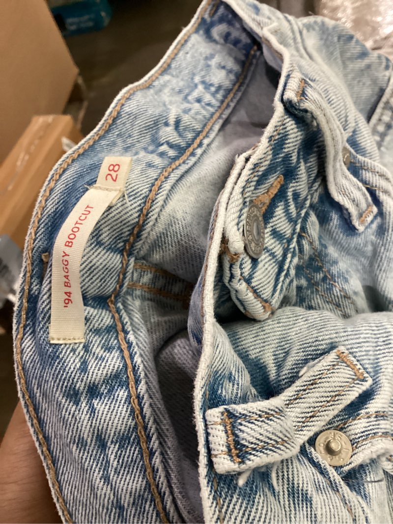 Condition photo showing Good Condition for levis light blue size 28 baggy bootcut 