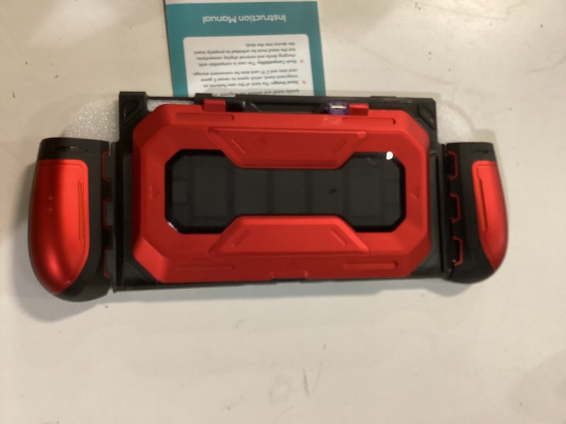 Condition photo showing Good Condition for Mumba Dockable for Nintendo Switch 2 Case with Flip Stand, [Titan] Ergonomic Switch 2 Grip Protective Cover Holds 5 Game Cards & 2 TF Cards TPU Accessories and Quick-Release Joy-Con Design (Ruddy)