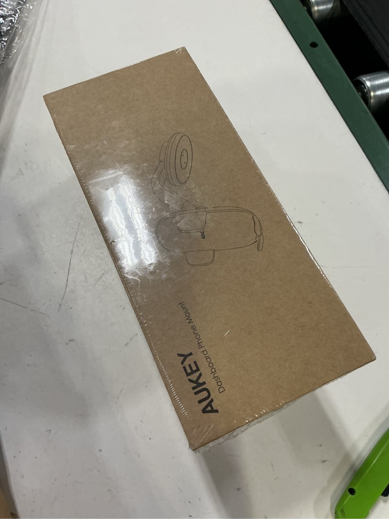 Condition photo showing New/Like New for aukey dashboard phone mount