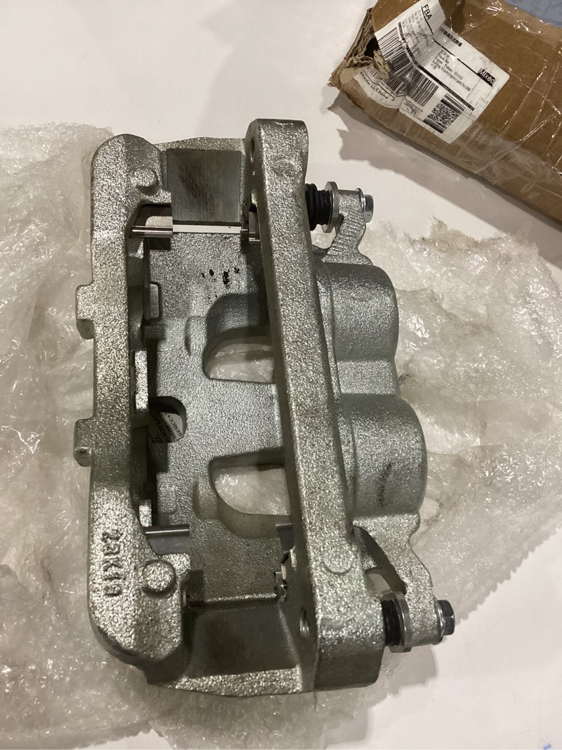 Condition photo showing As Is for USED A-Premium Disc Brake Caliper Assembly with Bracket Compatible with Select Ford Models - For F-250 Super Duty 2013-2022, F-350 Super Duty 2013-2022, F-450 Super Duty 2013-2015 - Front Left Driver Side