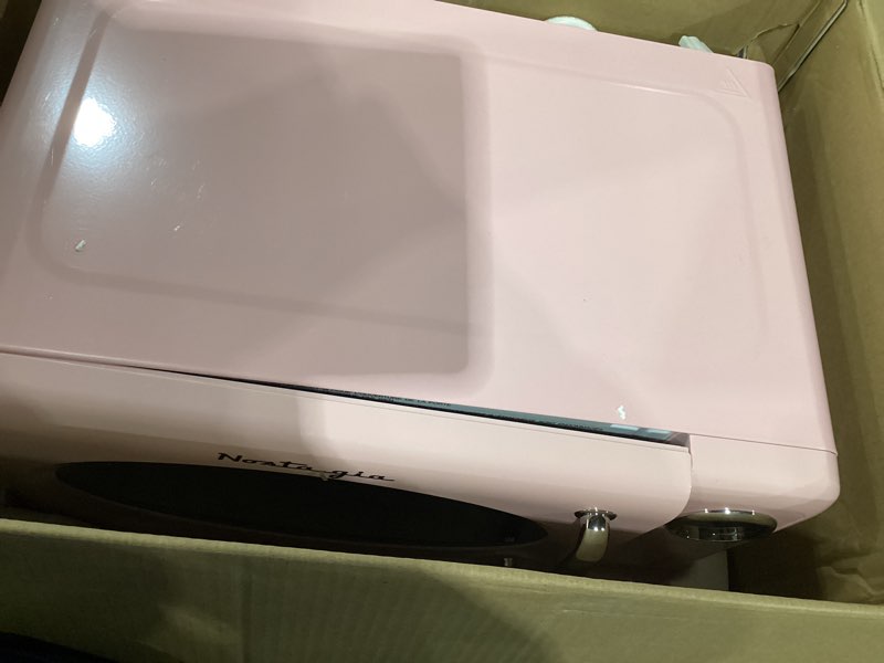 Condition photo showing As Is for 700 watt microwave