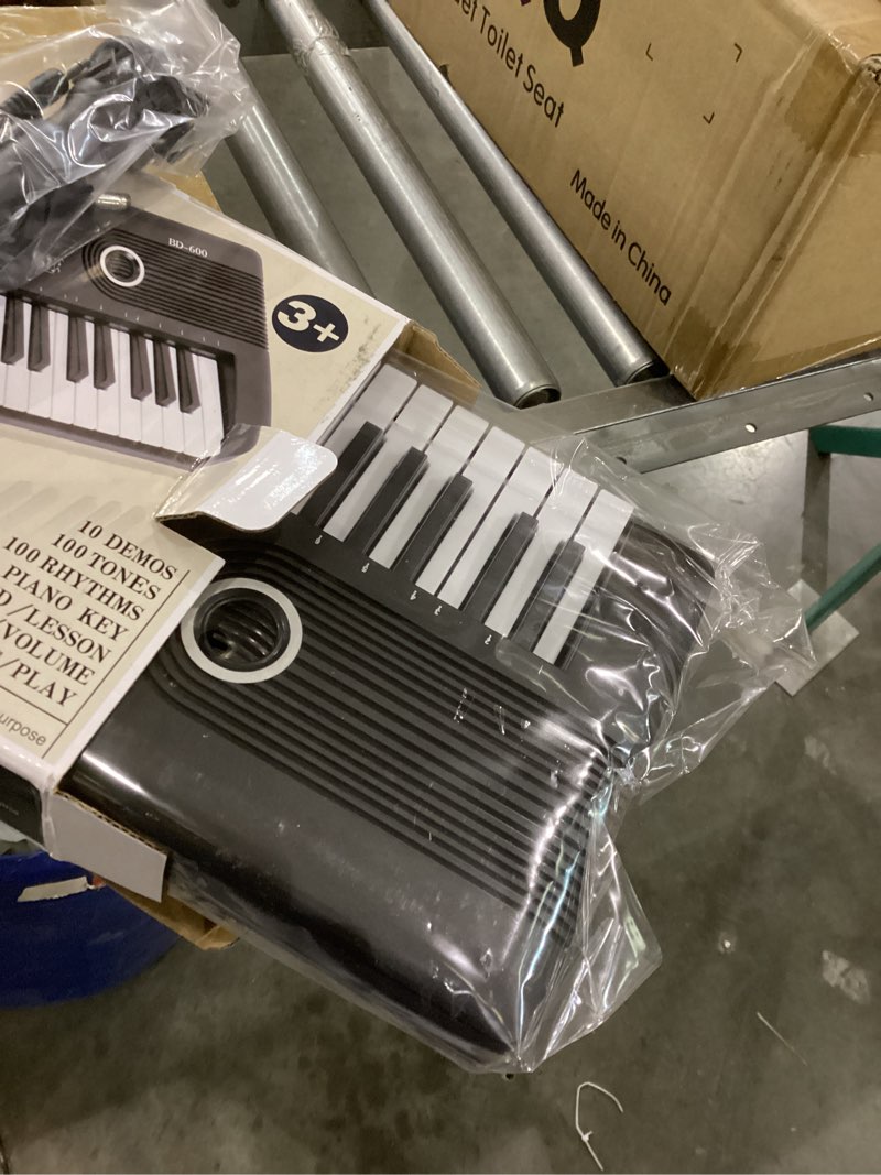 Condition photo showing New/Like New for 61 keys keyboard piano, Electronic Digital Piano with Built-In Speaker Microphone, Portable Keyboard Gift Teaching for Beginners, electric piano for kids Black