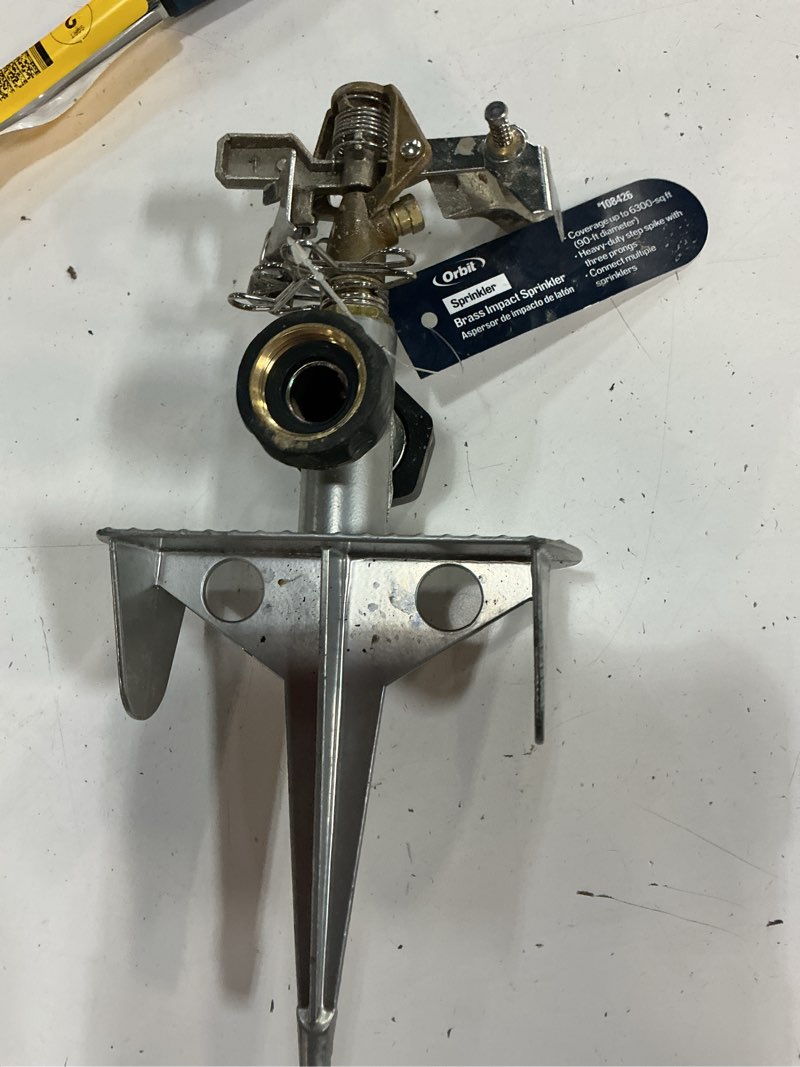 Condition photo showing As Is for orbit 6200-sq ft impulse spike lawn sprinkler
