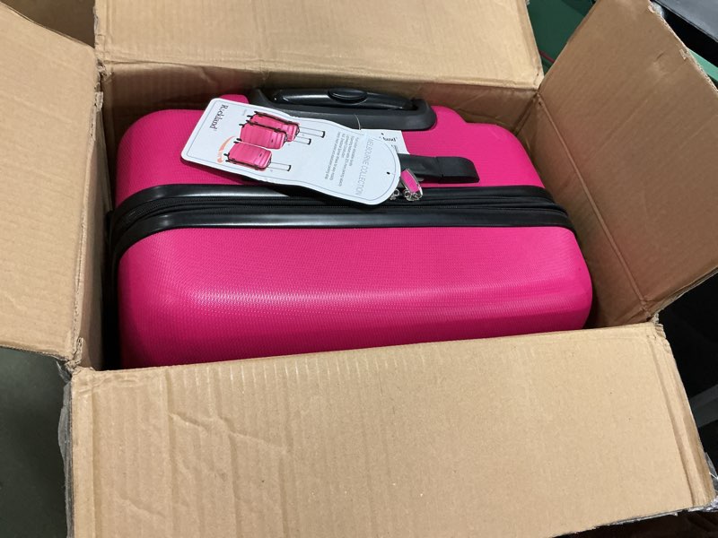 Condition photo showing Good Condition for Rockland Melbourne Hardside Expandable Spinner Wheel Luggage, Magenta, 3-Piece Set (20/24/28)