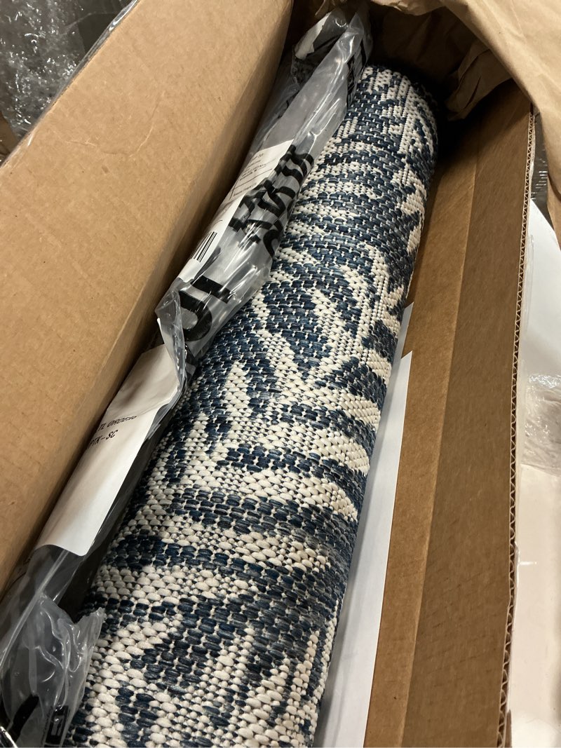 Condition photo showing Good Condition for (similar)jonathan y palm frond indoor outdoor runner rug 2x8 navy/ivory, nevis for backyard, patio, porch, easy-cleaning, high traffic, pet-friendly, non-shedding (smb119b-28) navy/ivory 2'2\" x 8' (runner)