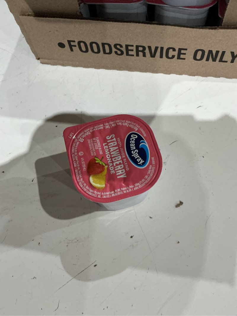 Condition photo showing As Is for expired))ocean spray® 100% strawberry lemonade juice drink, 4 fl oz cup, 48 count