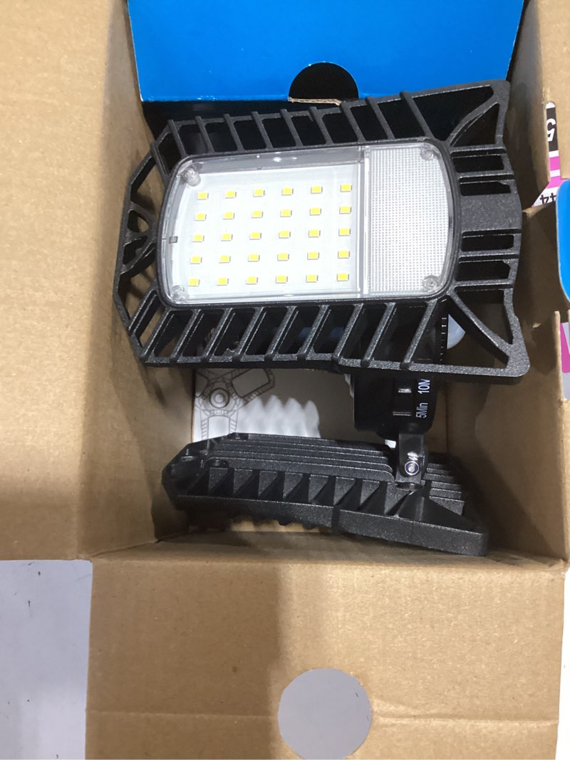 Condition photo showing As Is for utilitech 1-ft 8000-lumen black 3-light led diffuser garage shop light