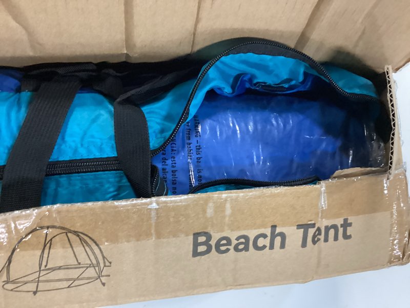 Condition photo showing New/Like New for rhino valley beach tent with double zippered doors