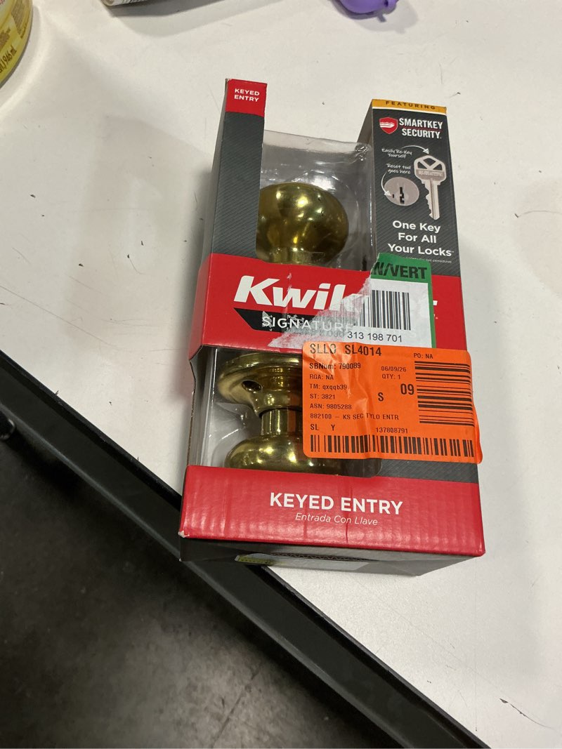 Condition photo showing As Is for kwikset smartkey juno polished brass entry door knob kw1 1-3/4 in.