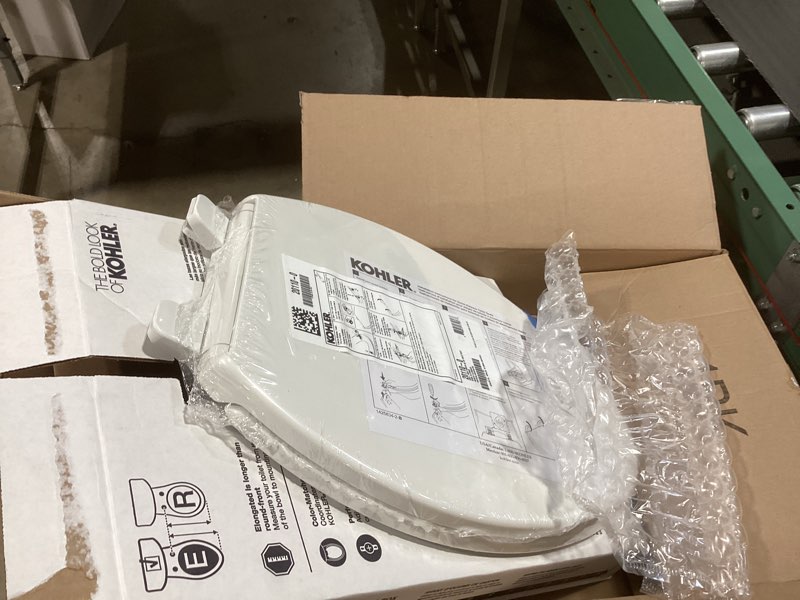 Condition photo showing New/Like New for kohler 20110-0 brevia, slow close toilet seat, elongated toilet seat, grip-tight bumpers quick-attach hardware, white white elongated quiet-close