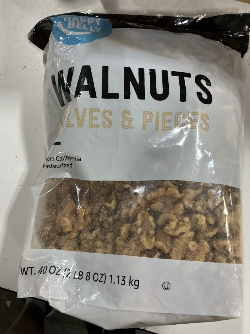 Condition photo showing Good Condition for Best by 12/15/26 Amazon Brand - Happy Belly California Walnuts Halves and Pieces, 40 ounce Walnuts Halves and Pieces 40 ounce