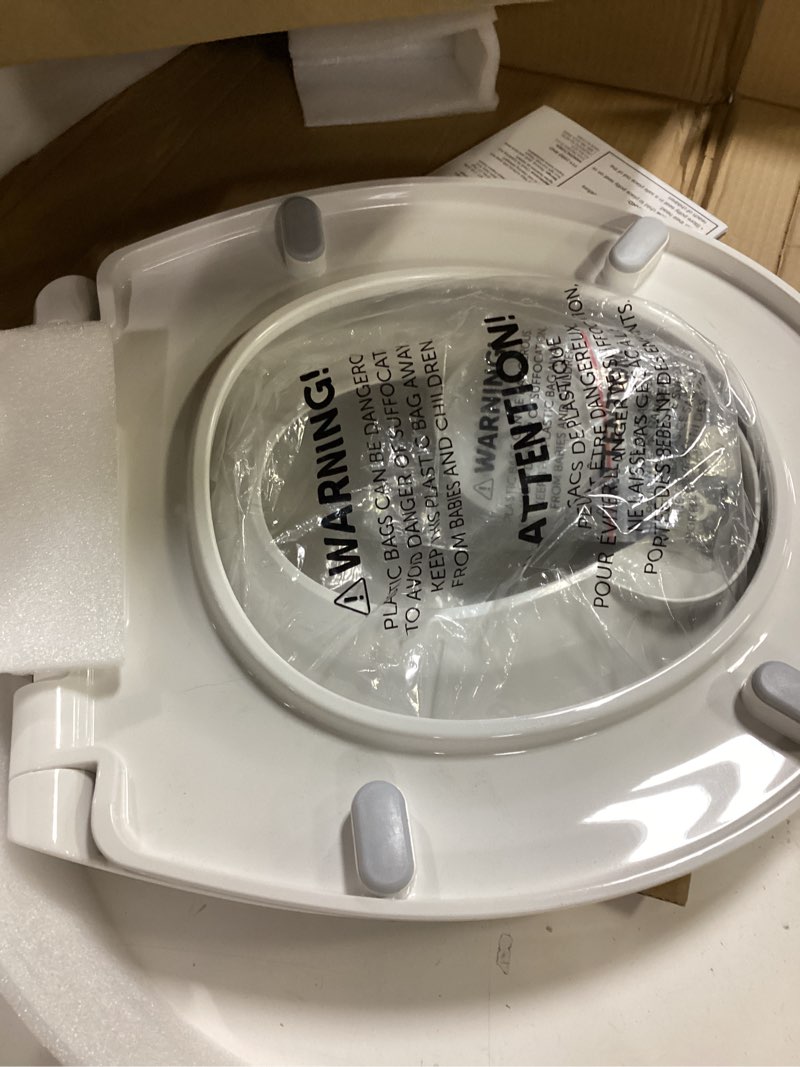 Condition photo showing New/Like New for quick flip toilet seat with built-in potty & splash guard for toddler training, slow close - jool baby (round)