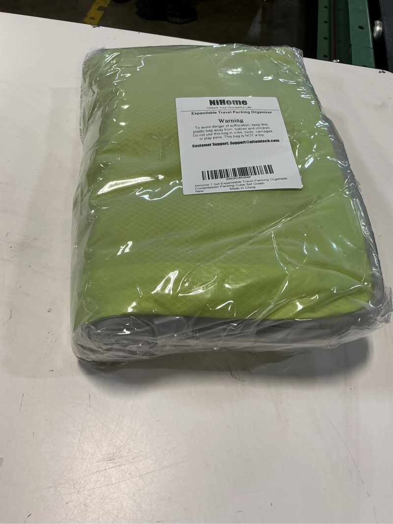 Condition photo showing New/Like New for nihome 7pcs compression packing cube set expandable mesh travel bag luggage organizers with electronic cable cord charger organizer drawstring bag (green)