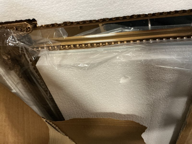 Condition photo showing As Is for Keonjinn Brass Vintage Mirror for Wall, 40" x 30" Antique Gold Mirrors with Metal Frame, Baroque Style Decoration for Mantle, Bathroom, Living Room, Fireplace, Bedroom, HD Shatterproof Glass Antique Brass 30"L x 40"W