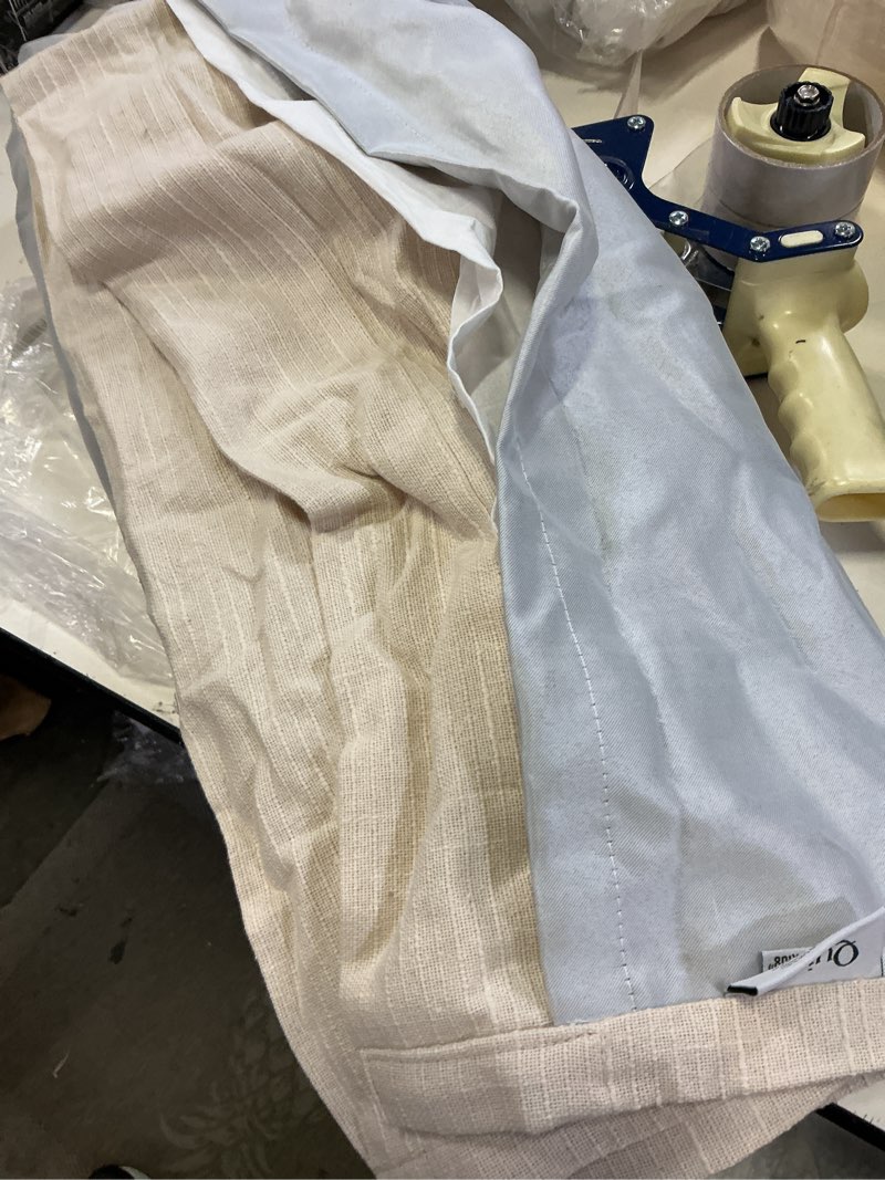 Condition photo showing As Is for textured cotton true blackout curtain panel single ivory  48”x108” in