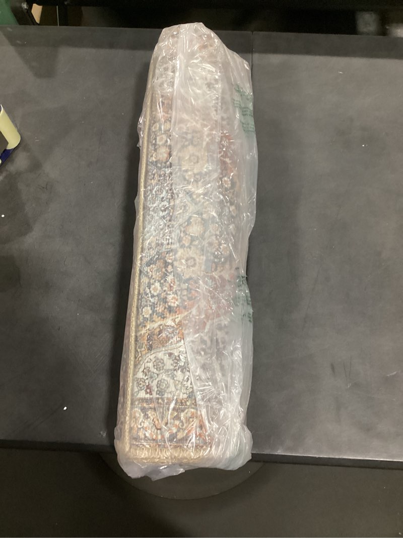 Condition photo showing Good Condition for loloi wynter collection wyn-01 red/multi 2'-0" x 5'-0" accent rug, .13" thick, area rug, soft, durable, printed, vintage inspired, low pile, non-shedding, easy clean, living room rug red / multi 2' x 5' (rectangular)