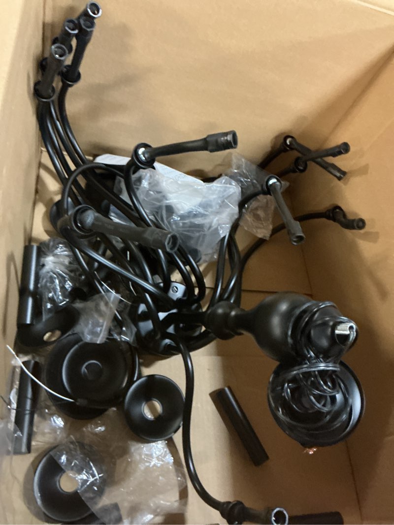 Condition photo showing As Is for Black Farmhouse Chandeliers for Dining Room Light Fixtures Over Table, 12 Light Industrial Candle Hanging Chandeliers for Living Room Kitchen Island Foyer Staircase Black 12 Lights D 37"