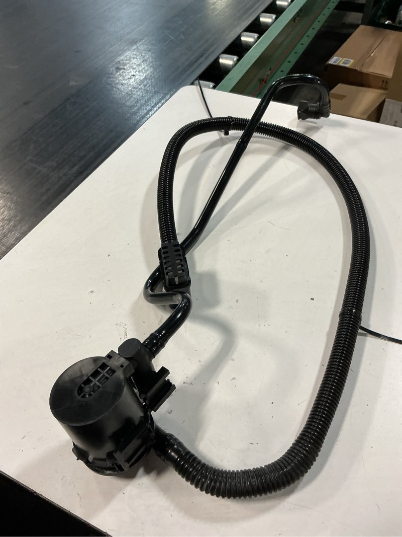 Condition photo showing As Is for dorman 911-064 vapor canister vent solenoid compatible with select cadillac/chevrolet/gmc models