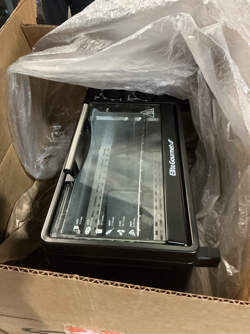Condition photo showing As Is for (Similar) TOSHIBA AC25CEW-BS Large 6-Slice Convection Toaster Oven Countertop, 10-In-One with Toast, Pizza and Rotisserie, 1500W, Black Stainless Steel, Includes 6 Accessories Black Stainless Steel 25L-BS