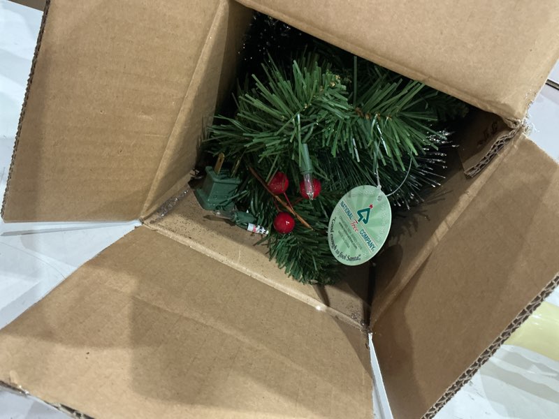 Condition photo showing Good Condition for national tree company 9 ft pre-lit crestwood spruce artificial christmas garland, christmas decoration with glitter, pinecones, red berries, 50 clear lights, 180 tips, green plug in tree