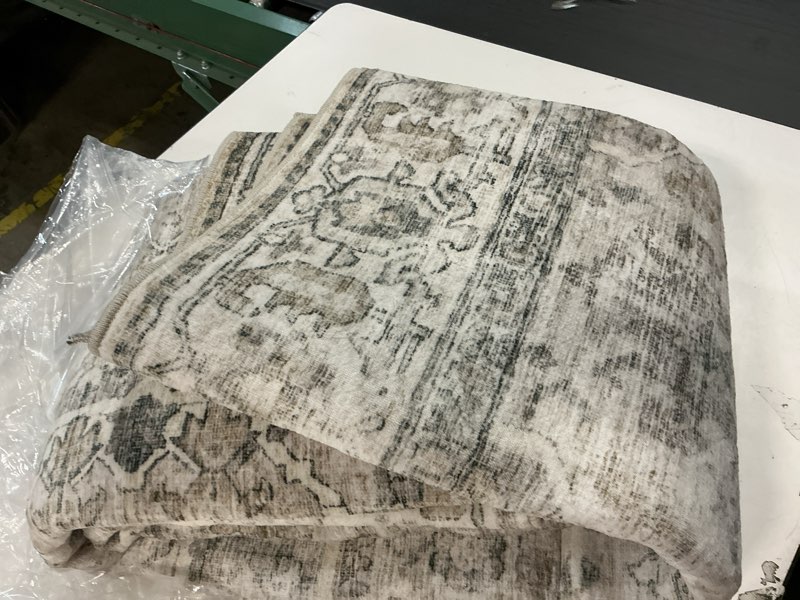 Condition photo showing item condition for Washable Area Rugs for Living Room: 5x7 Bedroom Area Rugs Boho Vintage Rugs Stain Resistant Non Slip Low Pile Soft Lightweight Carpet for Kitchen Dining Room Farmhouse Nursery Kids Room Home Office 5' x 7' (Rectangular) Brown and Cream