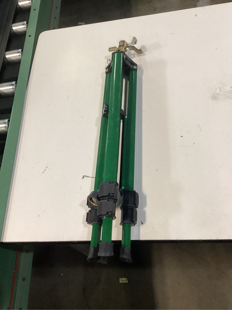 Condition photo showing As Is for orbit zinc impact sprinkler on tripod base 