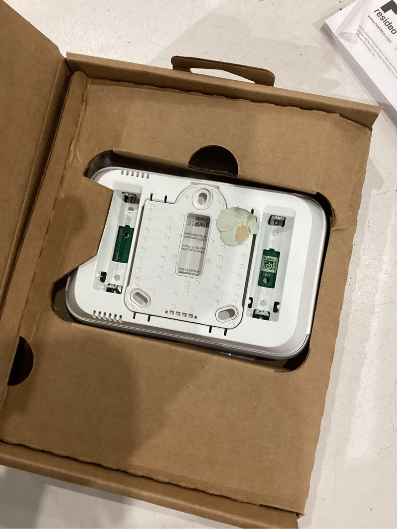 Condition photo showing As Is for x2p programmable thermostat, conventional/heat pump, flexible schedule