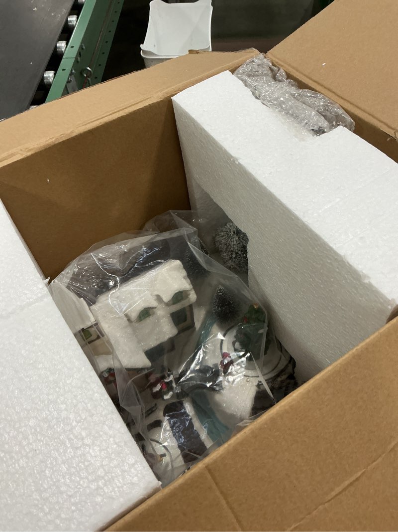 Condition photo showing Good Condition for Christmas Village Houses, Polyresin Christmas House Village with Moving Train & Colorful Warm LED Lights & 8 Songs,Battery Operated Vintage Style Home Decoration Village House Sets