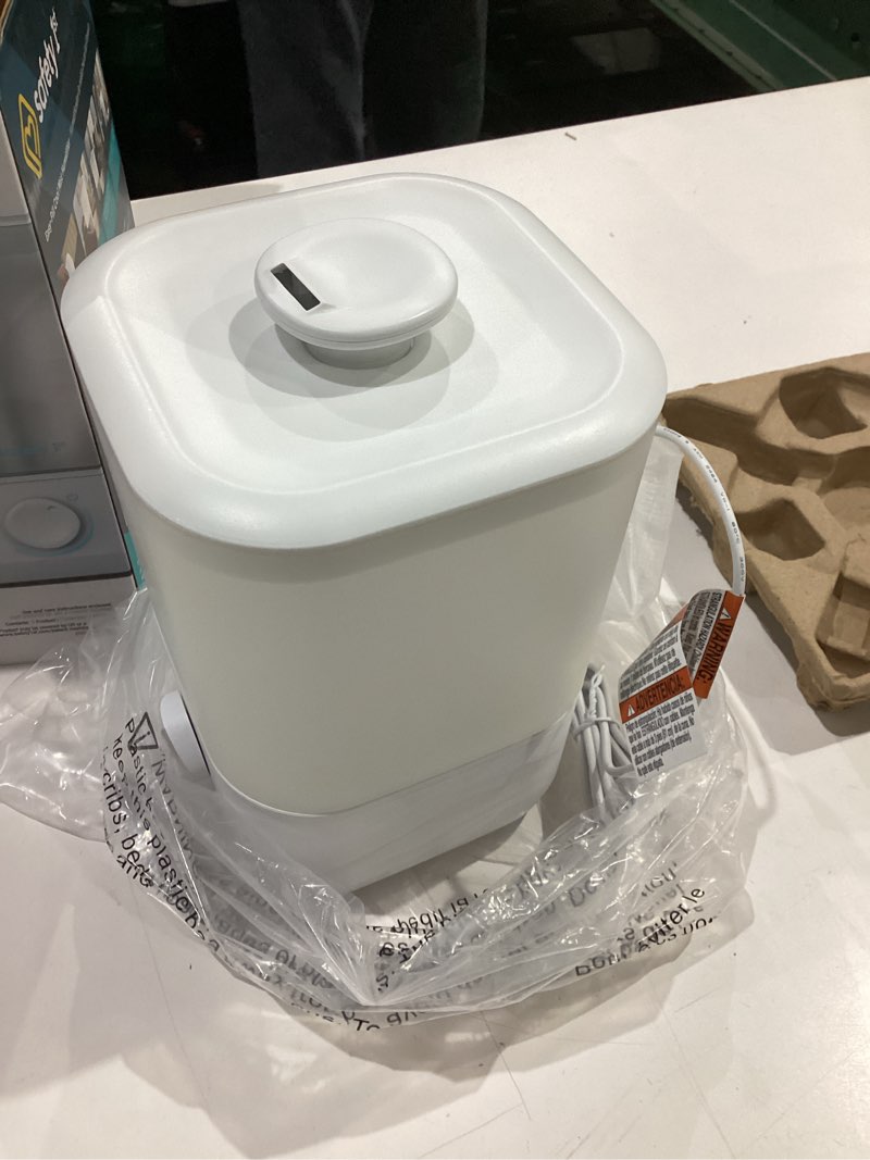 Condition photo showing As Is for safety 1st easy-fill cool mist humidifier, white