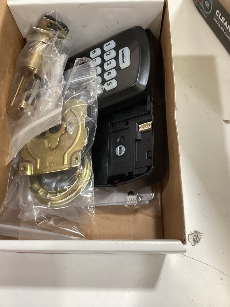 Condition photo showing As Is for kwikset powerbolt 250 10-button keypad matte black transitional electronic deadbolt door lock, featuring convenient keyless entry, customizable user codes and auto-locking