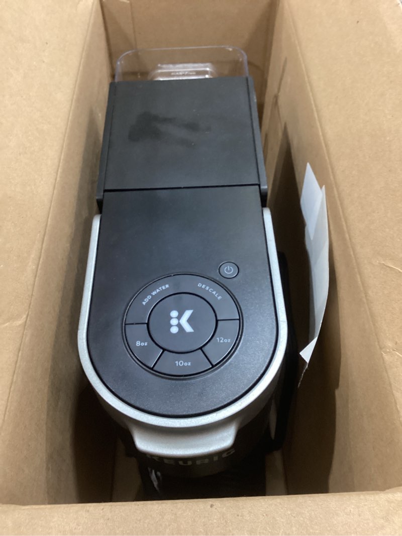 Condition photo showing As Is for keurig k-slim single serve k-cup pod coffee maker, multistream technology, 3 brew sizes, slim and sleek design, 46oz removable reservoir, black