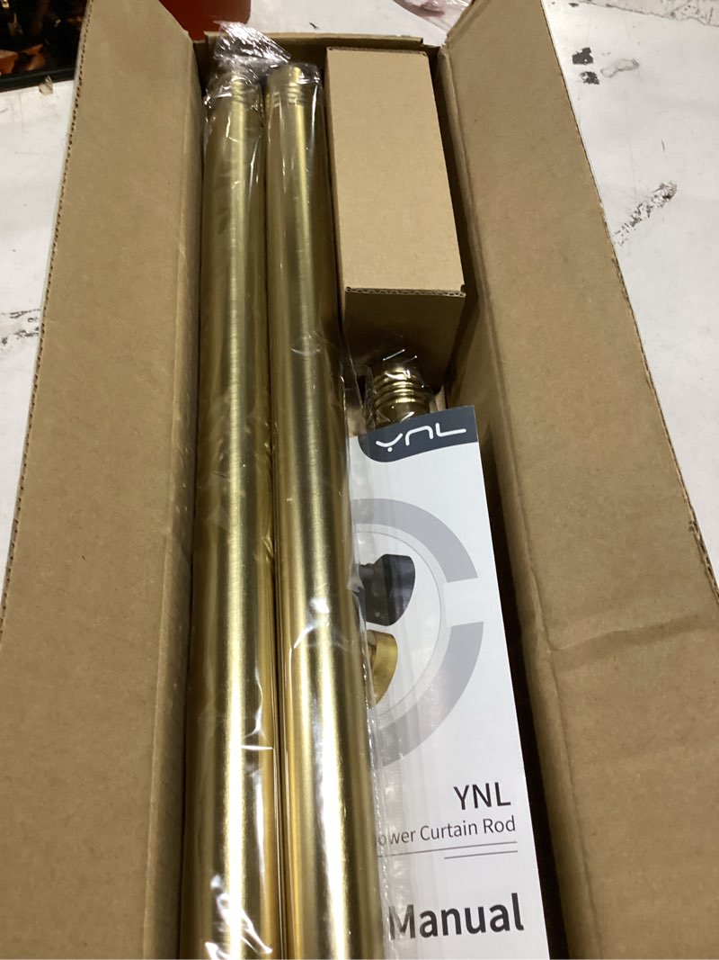Condition photo showing As Is for ynl shower curtain rod 34-82 inches (2.8-6.8ft) adjustable spring shower rod no drilling, non-slip, never rust, stainless steel, suitable for bathroom window living room, gold gold m:34-82"