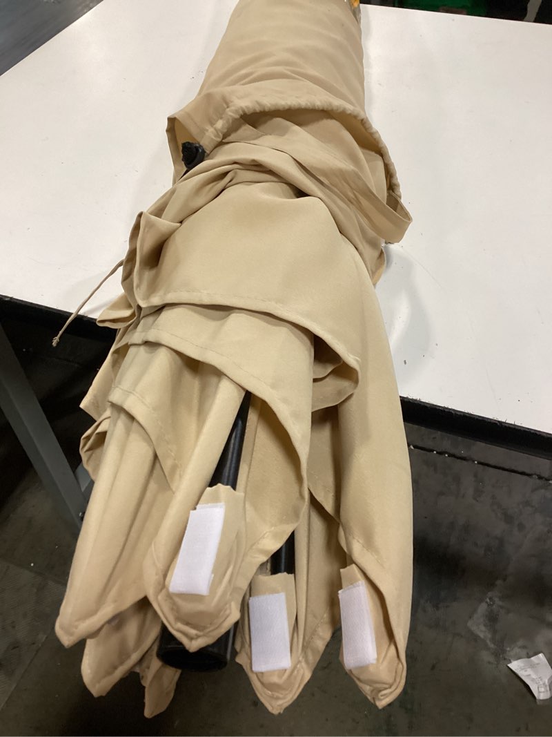 Condition photo showing As Is for simplyshade 9-ft aluminum tan slide-tilt market patio umbrella