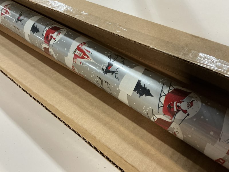 Condition photo showing New/Like New for American Greetings Jumbo Black Christmas Wrapping Paper Roll, Silver and Black Holiday Gift Wrap (175 sq. ft., 1 Extra Large Roll-30 in. x 70 ft.) Stripes and Snowflakes